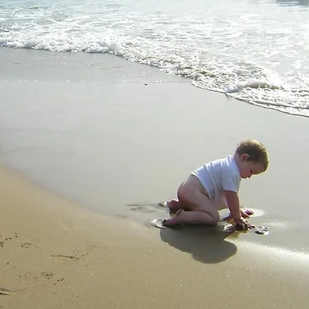 Spiros On Agios Gordios Beach, Corfu, Greece